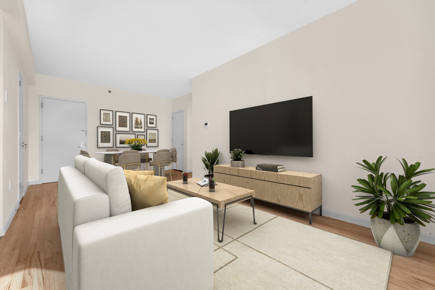 41-02 Queens Boulevard, Unit 5E Queens, NY 11104 - Photo 3 of 7 a living room with furniture and a flat screen tv