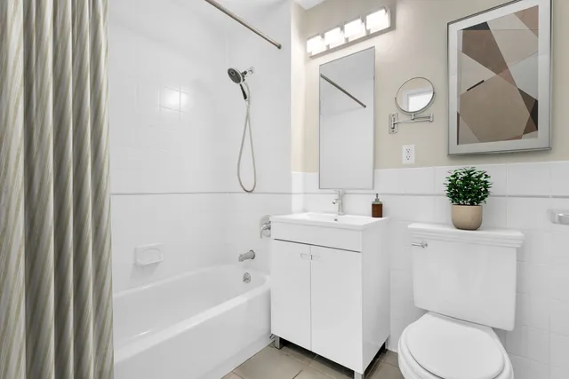 a view of a dining room with furniture and window