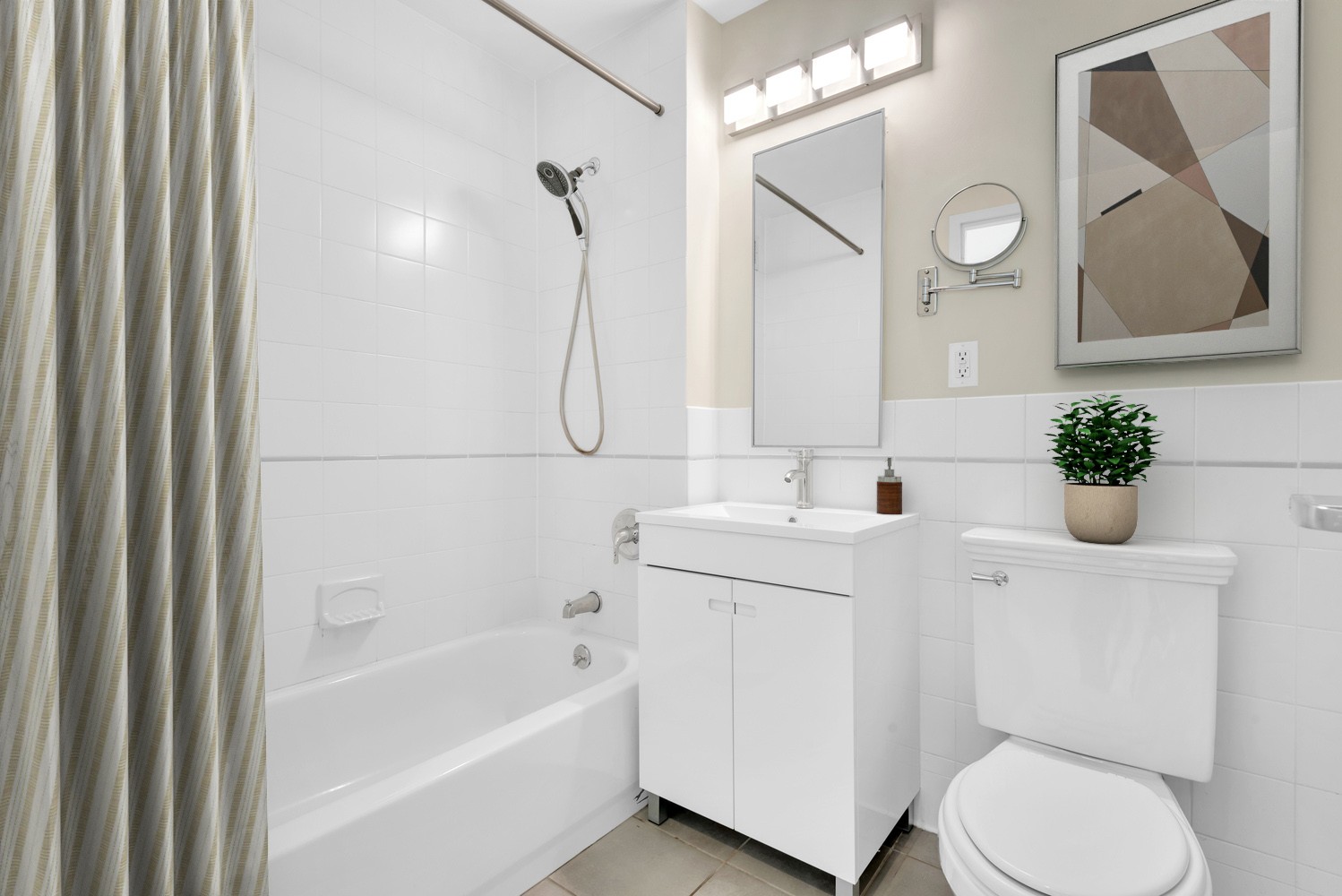 41-02 Queens Boulevard, Unit 5E Queens, NY 11104 - Photo 5 of 7 a bathroom with a sink toilet and shower