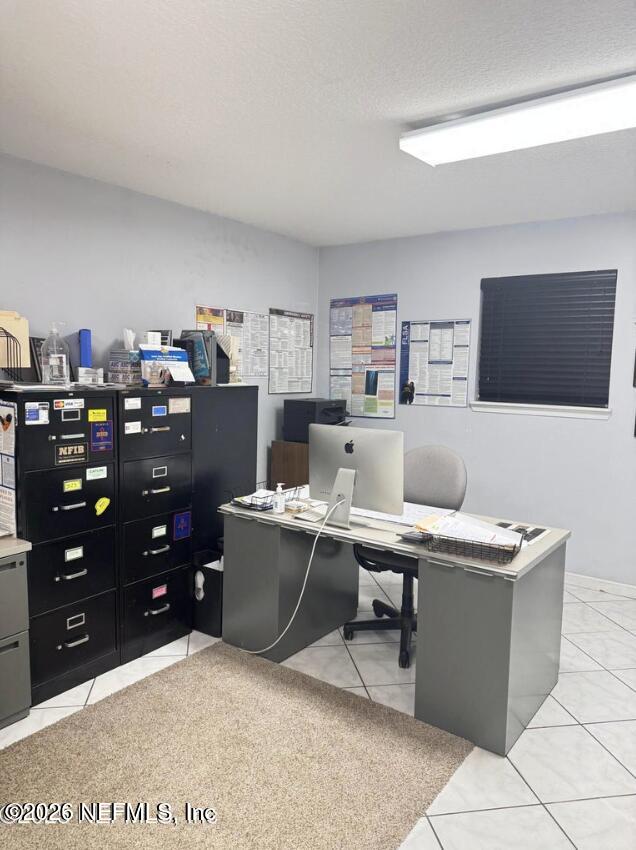 8540 West Beaver Street Jacksonville, FL 32220 - Photo 12 of 18 a view of a workspace with furniture
