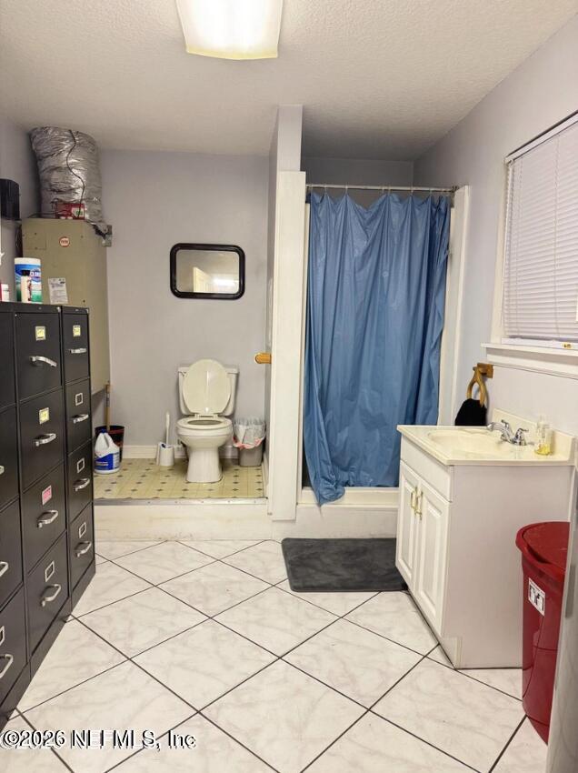 8540 West Beaver Street Jacksonville, FL 32220 - Photo 18 of 18 a living room with a sink and a cabinets