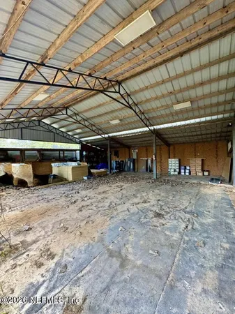 a view of a big room with a roof