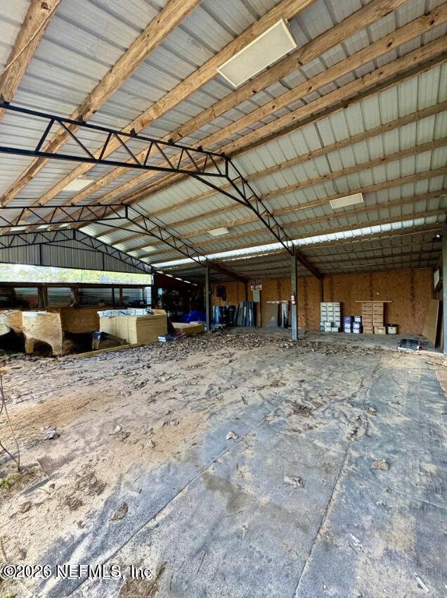 8540 West Beaver Street Jacksonville, FL 32220 - Photo 8 of 18 a view of a big room with a roof