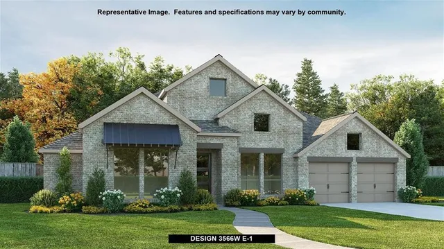 a front view of a house with a yard and potted plants