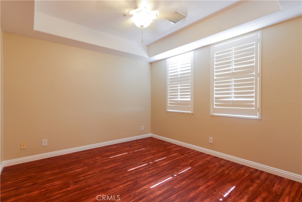 32 Garrison Loop Ladera Ranch, CA 92694 - Photo 16 of 31 Primary bedroom with ceiling fan & light