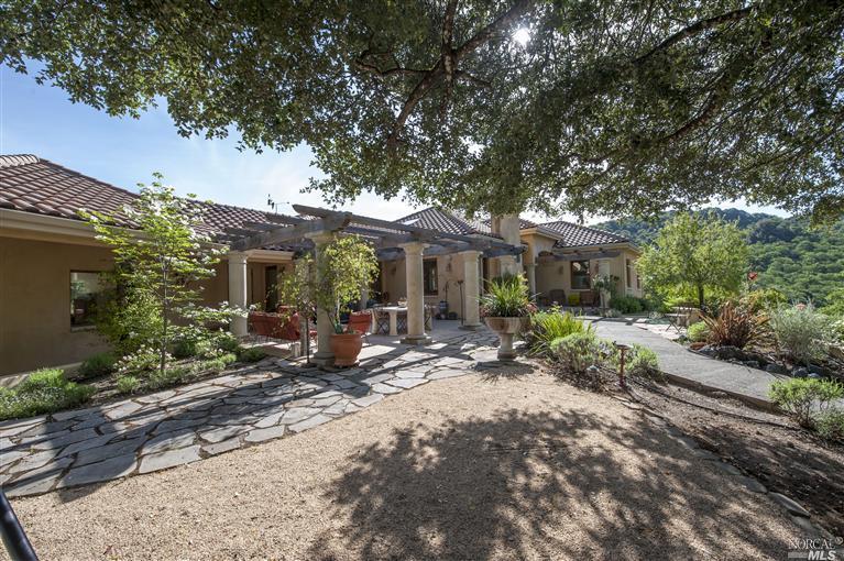 7001 Boonville Road Ukiah, CA 95482 - Photo 1 of 1 a view of a house with backyard porch and furniture