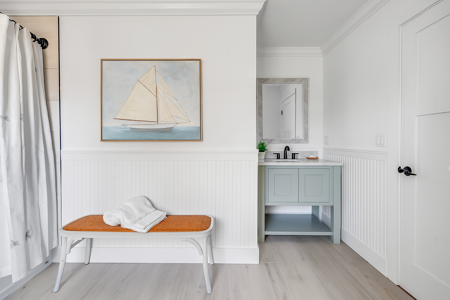 212 Milford Point Road Milford, CT 06460 - Photo 17 of 38 a bathroom with a sink and a mirror