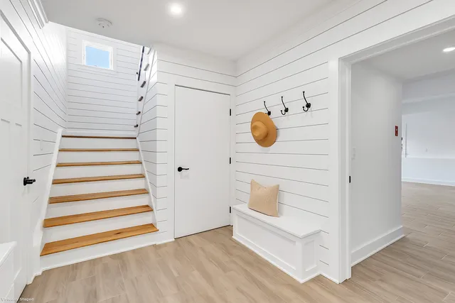 a view of a hallway with front door