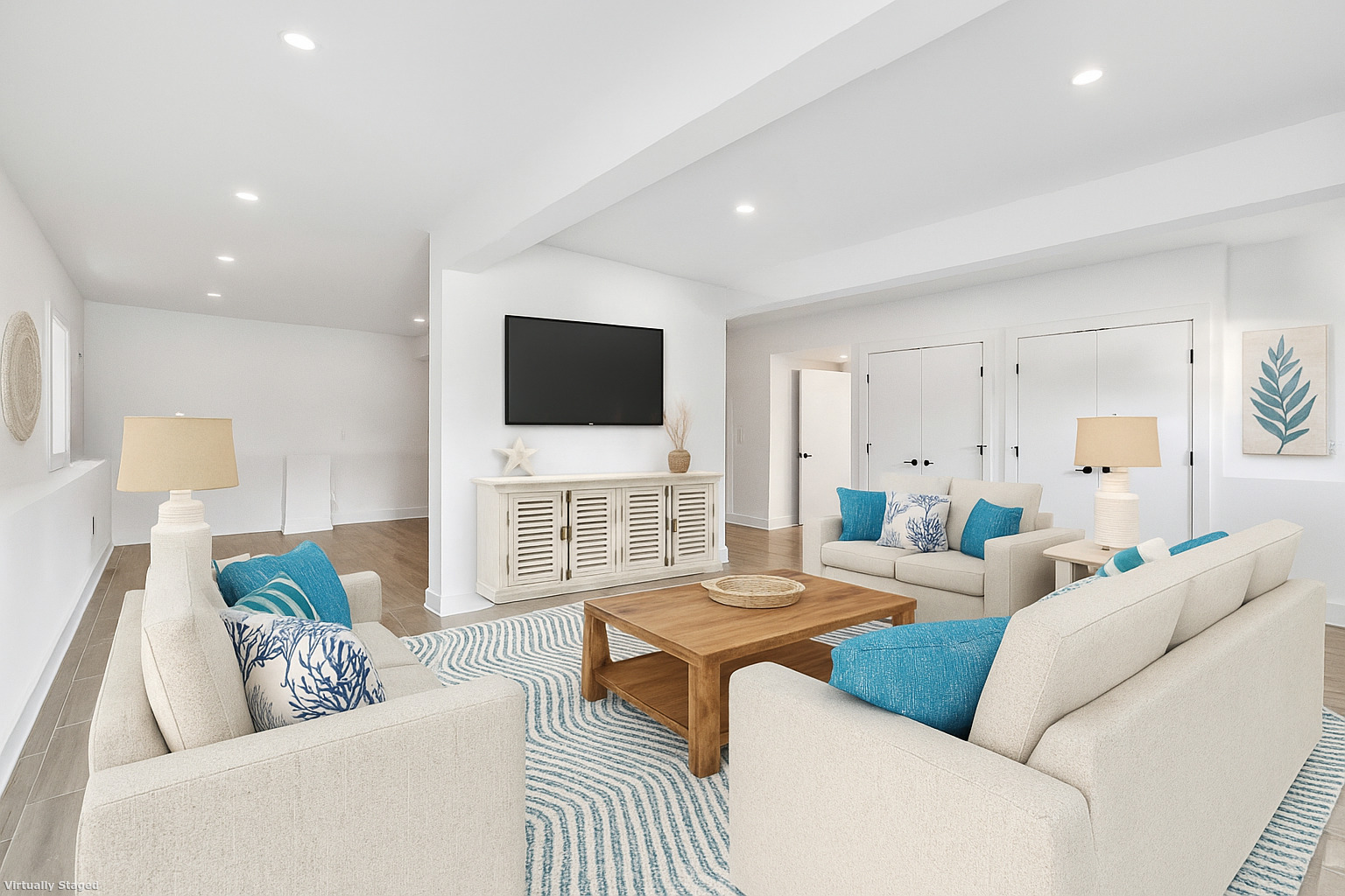 212 Milford Point Road Milford, CT 06460 - Photo 28 of 38 a living room with furniture and a flat screen tv