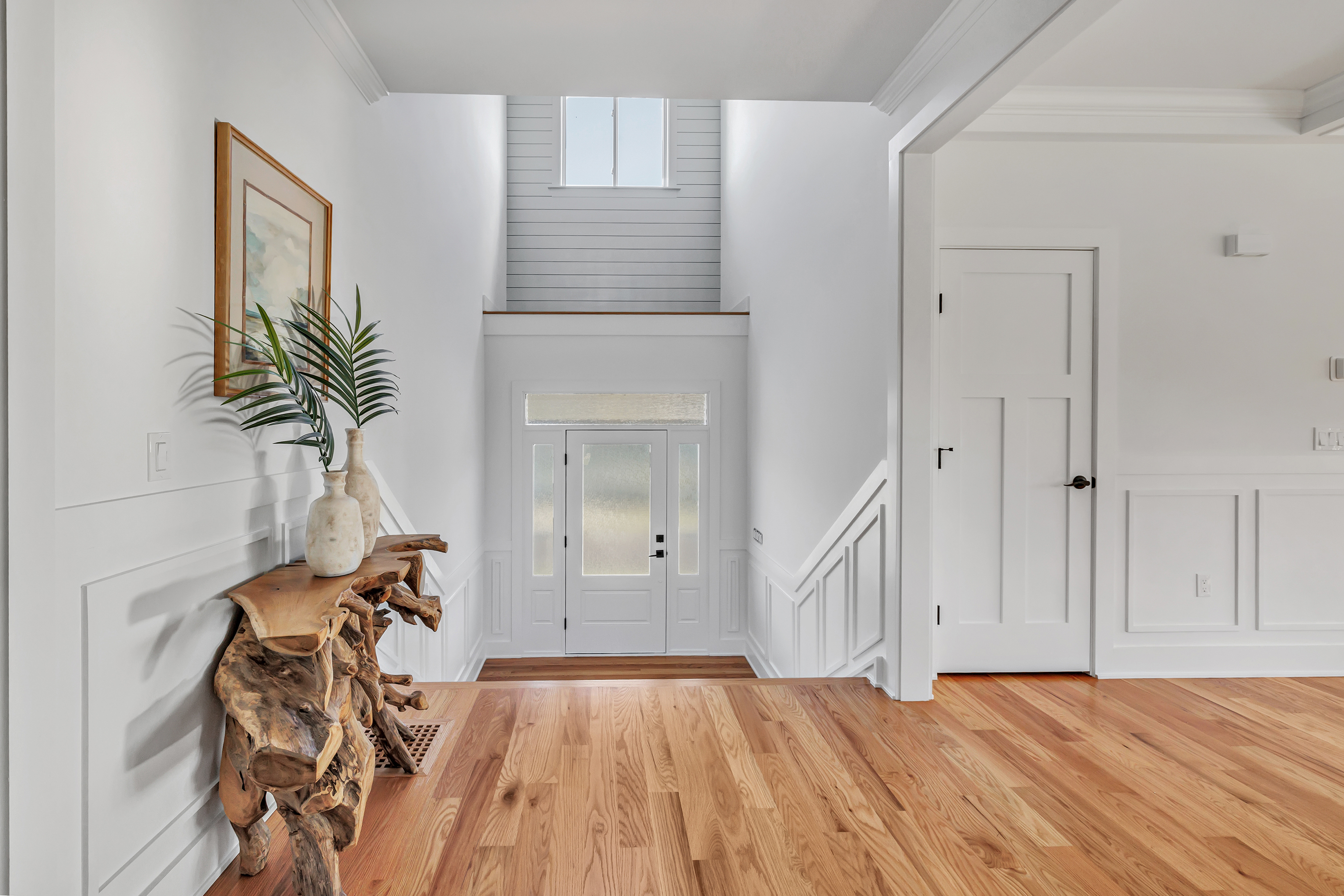 212 Milford Point Road Milford, CT 06460 - Photo 3 of 38 a view of empty room with window and wooden floor