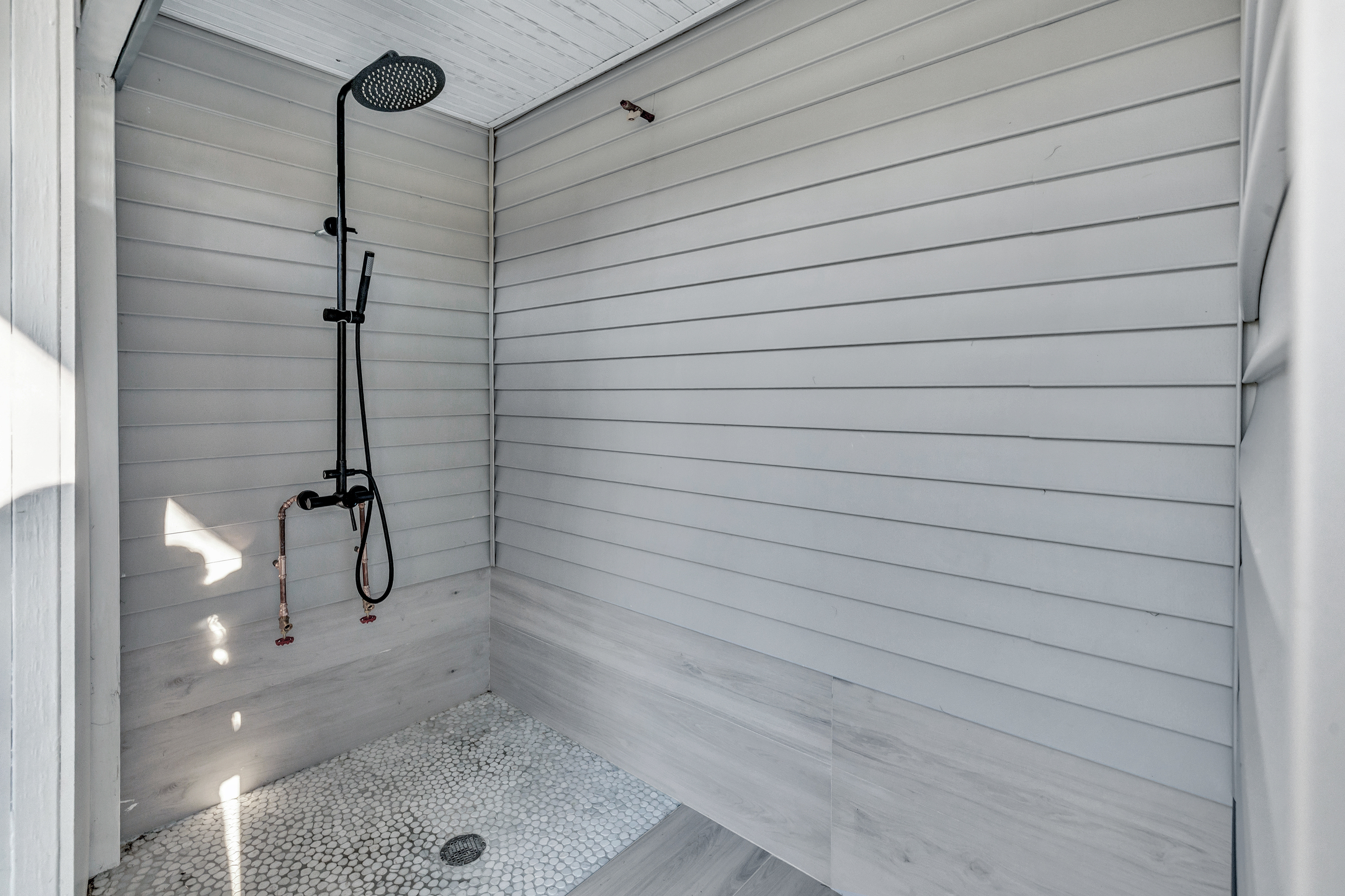 212 Milford Point Road Milford, CT 06460 - Photo 31 of 38 a bathroom with a shower