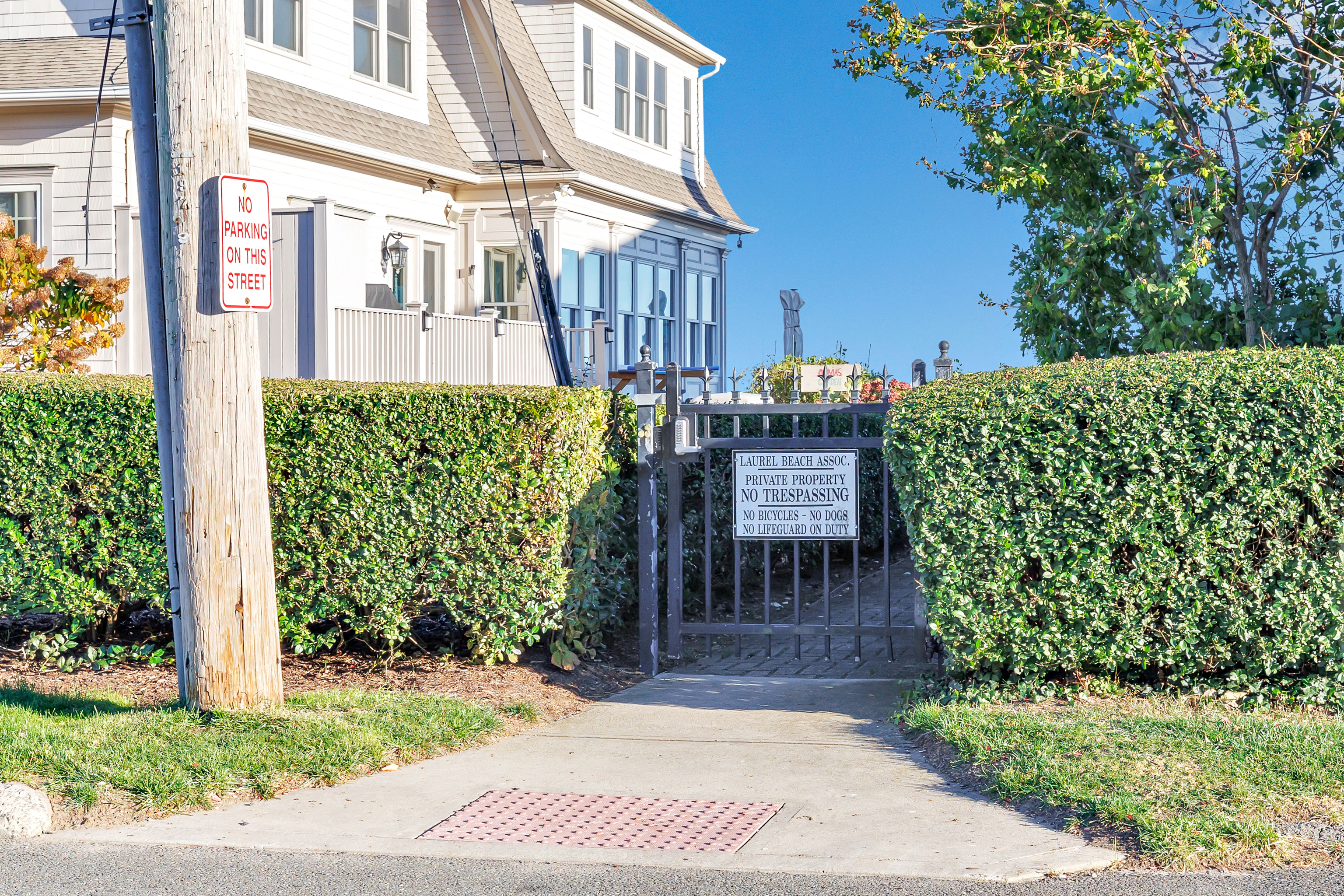 212 Milford Point Road Milford, CT 06460 - Photo 32 of 38 a view of a patio with table and chairs potted plants