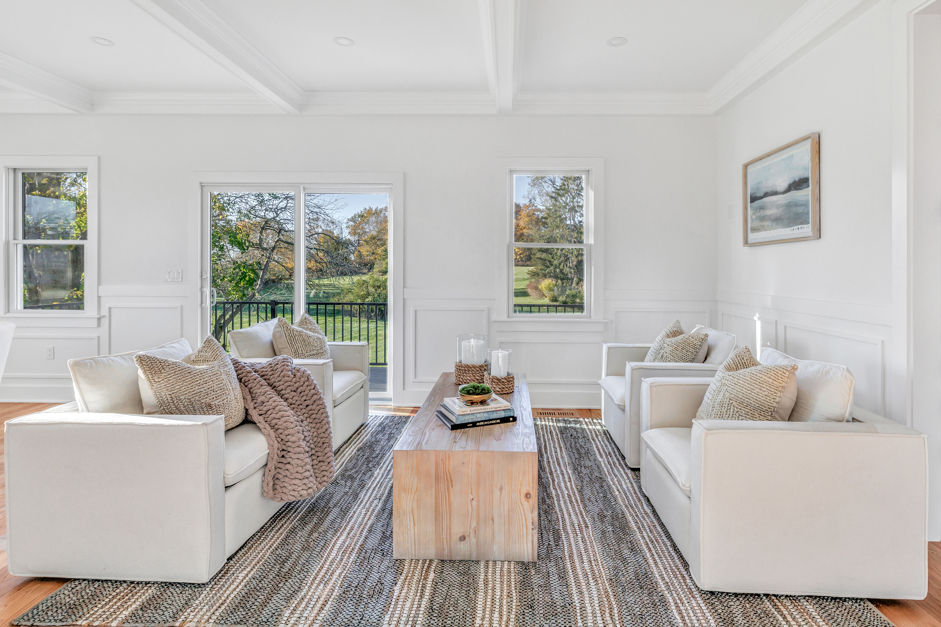 212 Milford Point Road Milford, CT 06460 - Photo 5 of 38 a living room with furniture and a large window
