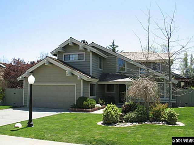 160 Edgewater Parkway Reno, NV 89519 - Photo 1 of 9 a front view of a house with a yard and garage