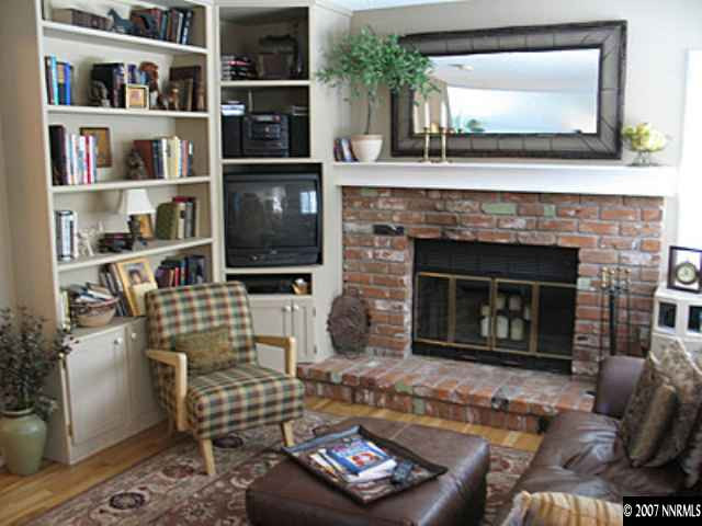 160 Edgewater Parkway Reno, NV 89519 - Photo 7 of 9 a living room with furniture and a fireplace