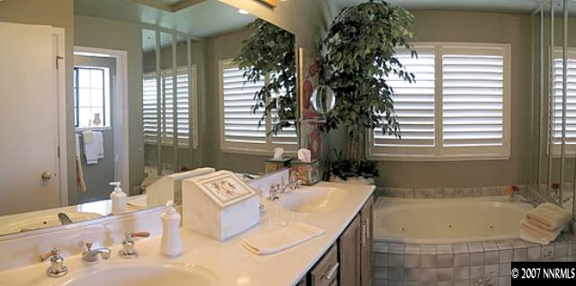 160 Edgewater Parkway Reno, NV 89519 - Photo 8 of 9 a bath tub sitting in a bathroom next to a tub