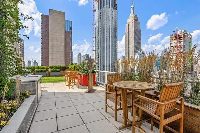 a view of a city with tall buildings