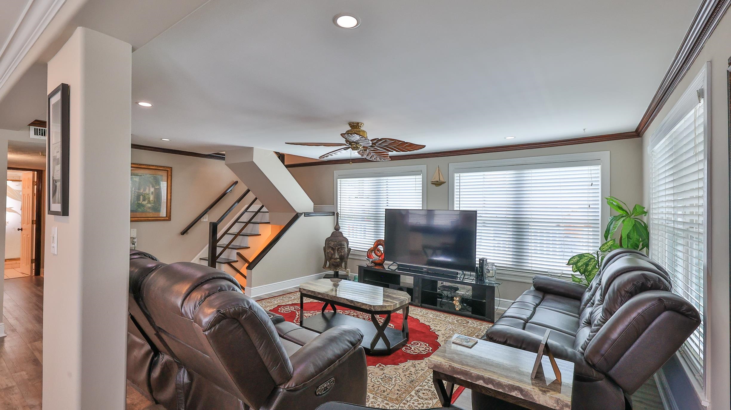 49 Zamora Street St. Augustine, FL 32084 - Photo 12 of 64 a living room with furniture and a flat screen tv