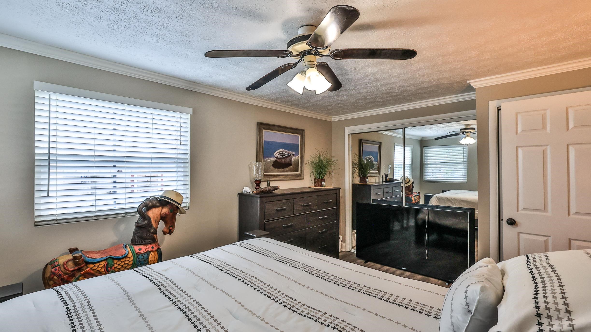 49 Zamora Street St. Augustine, FL 32084 - Photo 18 of 64 a bedroom with a bed and wooden floor
