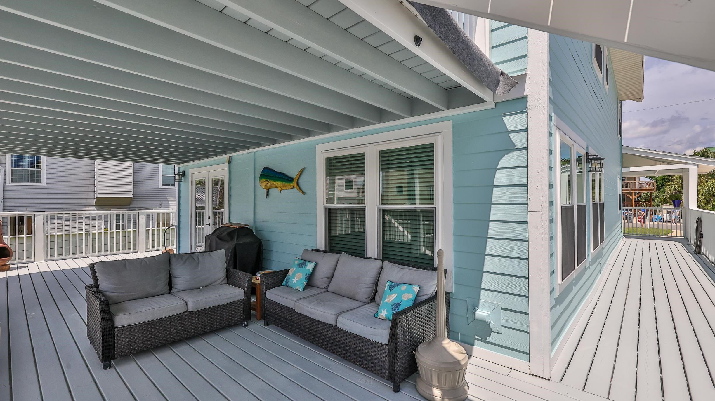 49 Zamora Street St. Augustine, FL 32084 - Photo 20 of 64 a balcony with furniture and a potted plant