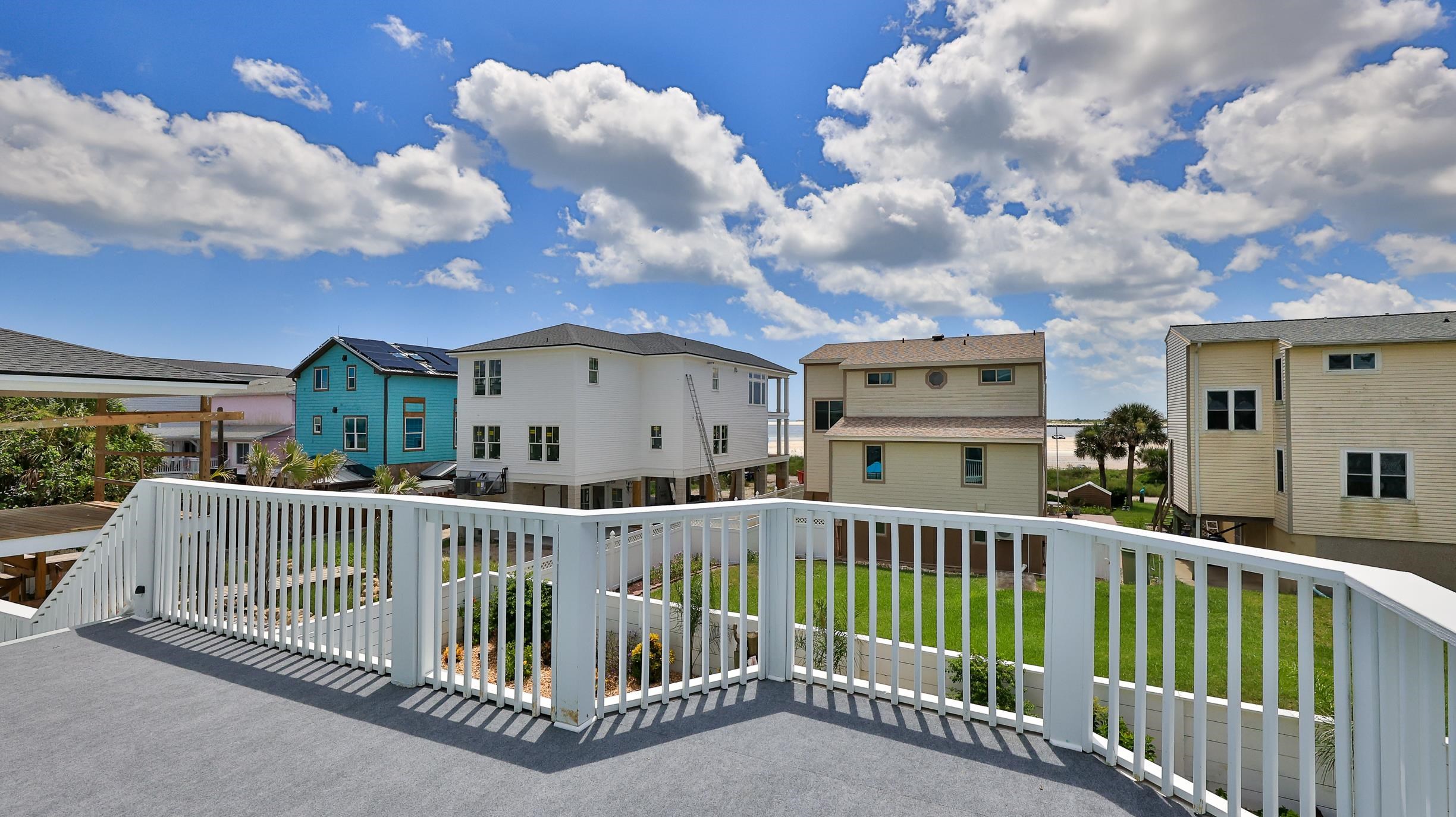49 Zamora Street St. Augustine, FL 32084 - Photo 28 of 64 a view of a balcony with wooden fence