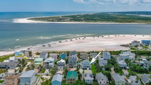 a view of an ocean and a building