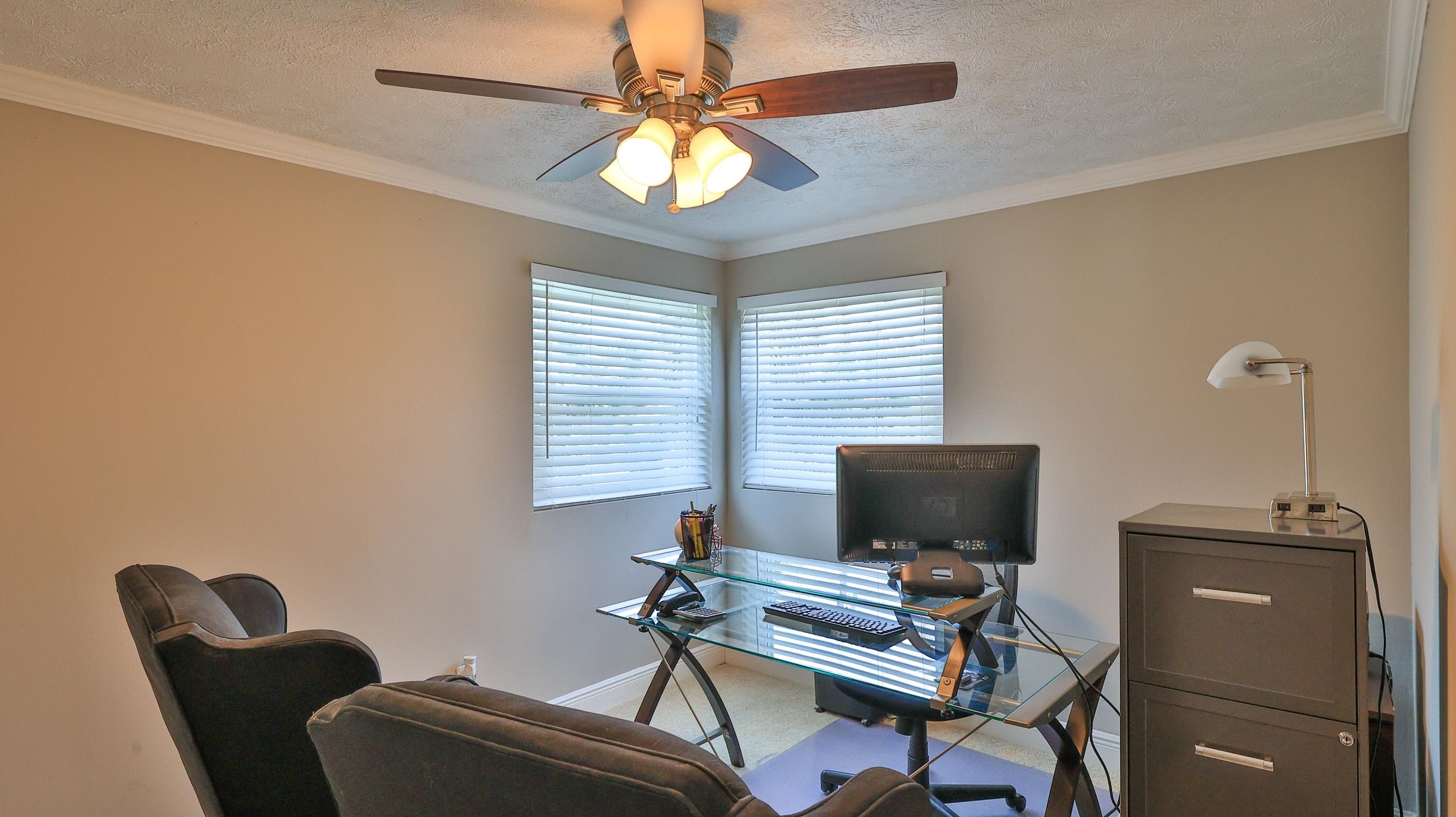 49 Zamora Street St. Augustine, FL 32084 - Photo 34 of 64 a view of a workspace with furniture and a window
