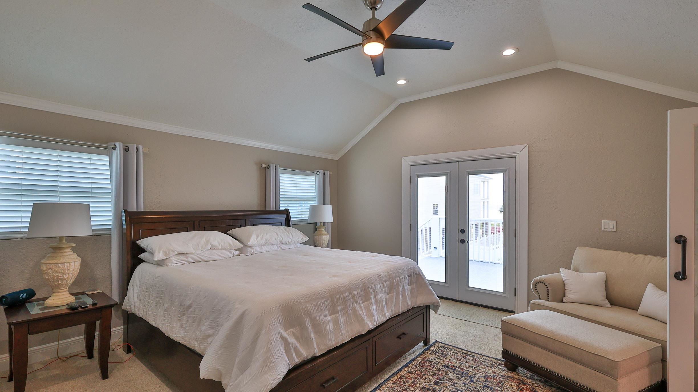49 Zamora Street St. Augustine, FL 32084 - Photo 36 of 64 a bedroom with a bed couch and window