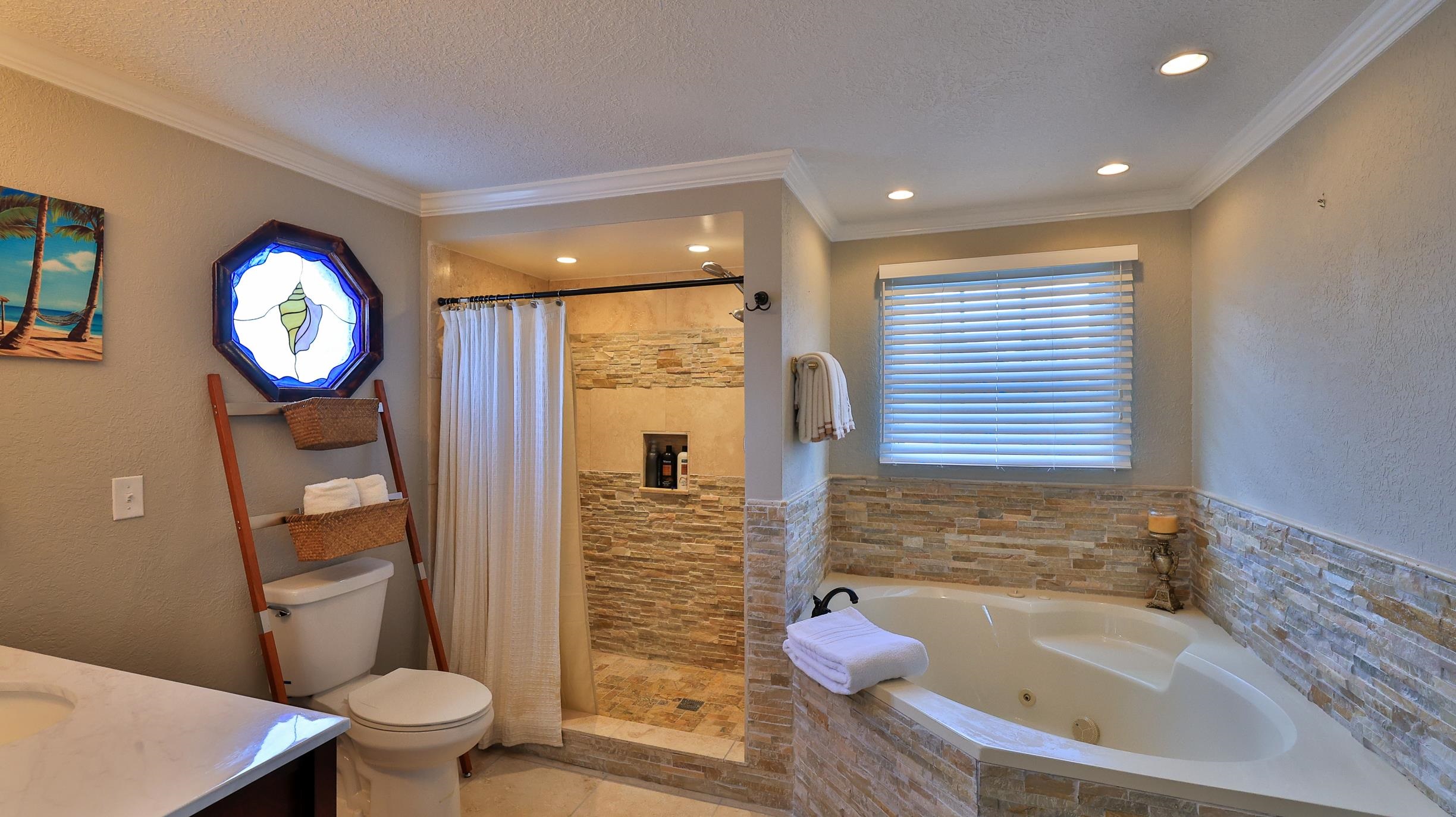 49 Zamora Street St. Augustine, FL 32084 - Photo 38 of 64 a bathroom with a sink a toilet and bathtub