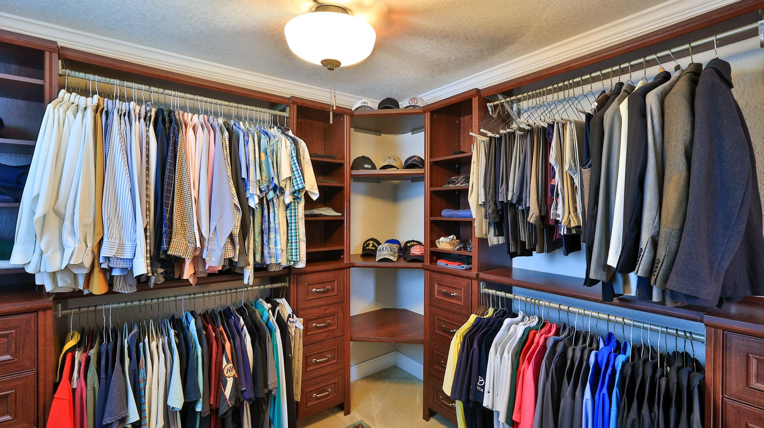 49 Zamora Street St. Augustine, FL 32084 - Photo 39 of 64 a view of walk in closet with clothes and shoes