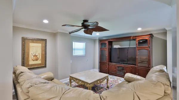 a view of a livingroom with furniture and wooden floor