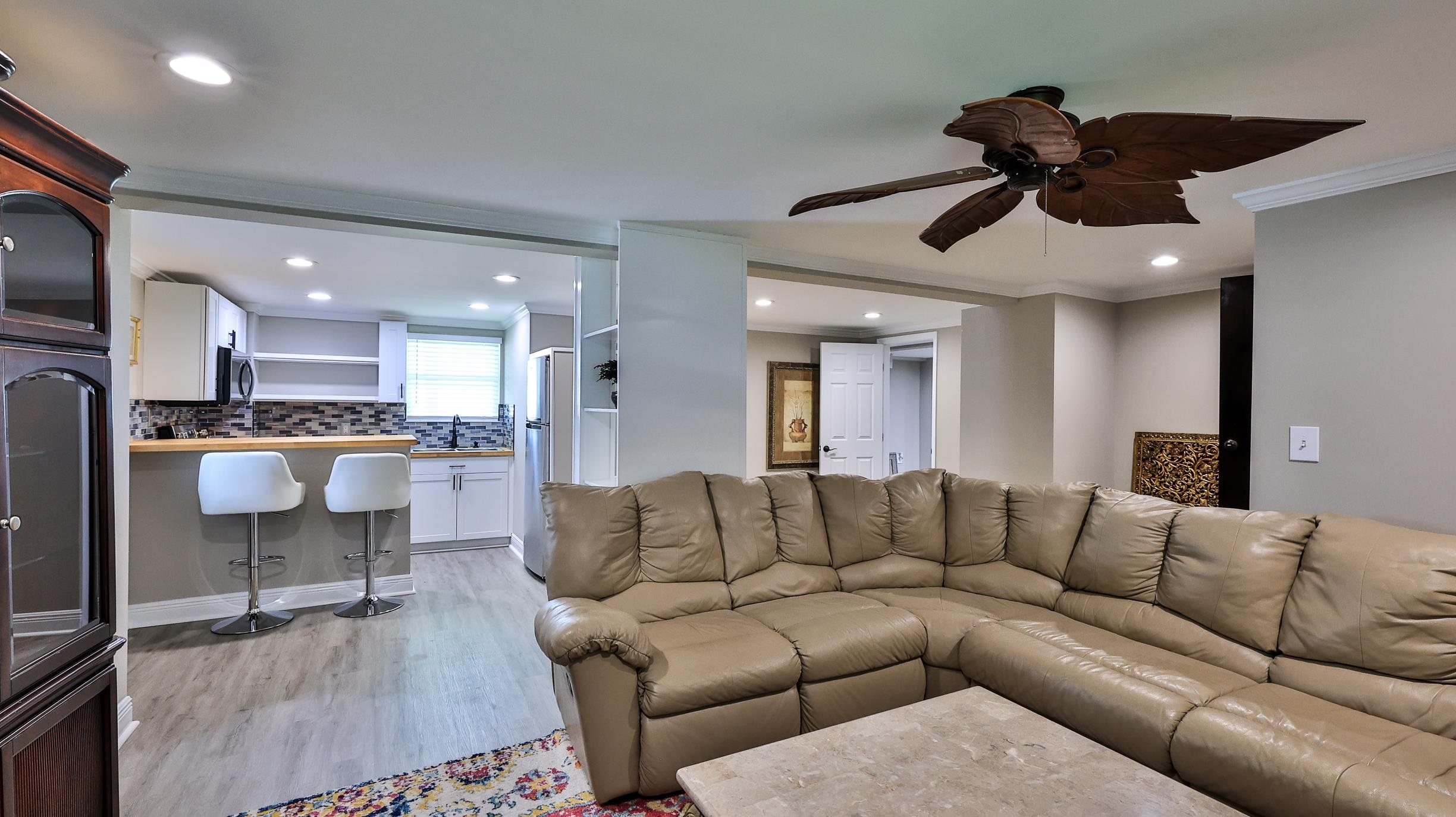 49 Zamora Street St. Augustine, FL 32084 - Photo 43 of 64 a living room with furniture and a view of kitchen