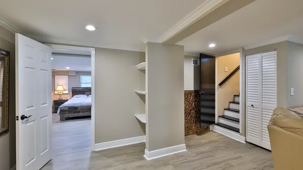 a room with a bed and a window