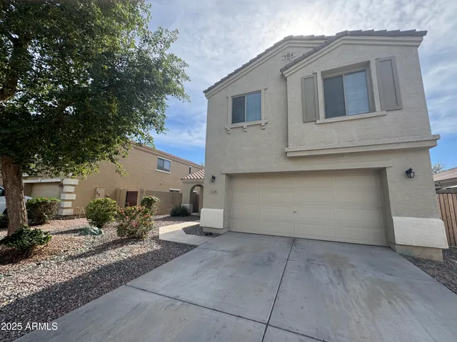 a view of a house with a patio