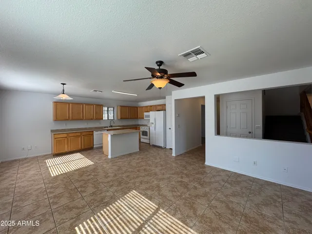 a view of a kitchen with a sink