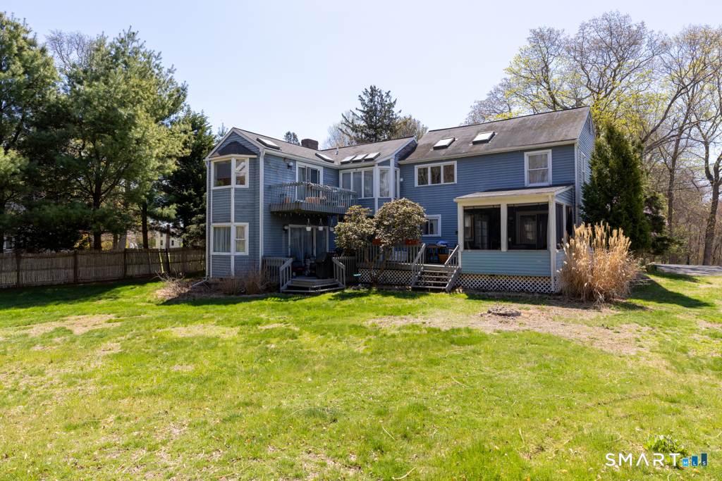 49 River Street Old Saybrook, CT 06475 - Photo 3 of 28 a swimming pool with outdoor seating and yard