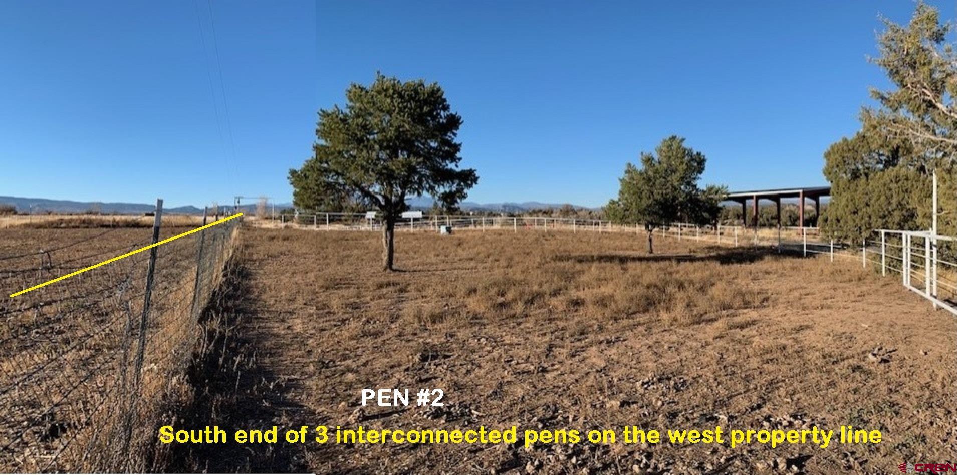 200 Thoroughbred Road Durango, CO 81303 - Photo 17 of 19 a view of a yard with wooden fence