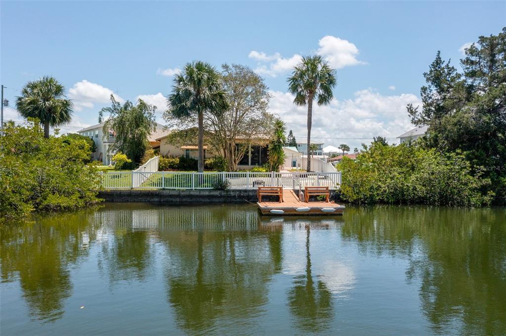 4315 Flexer Drive Hernando Beach, FL 34607 - Photo 11 of 48 a view of a lake with houses
