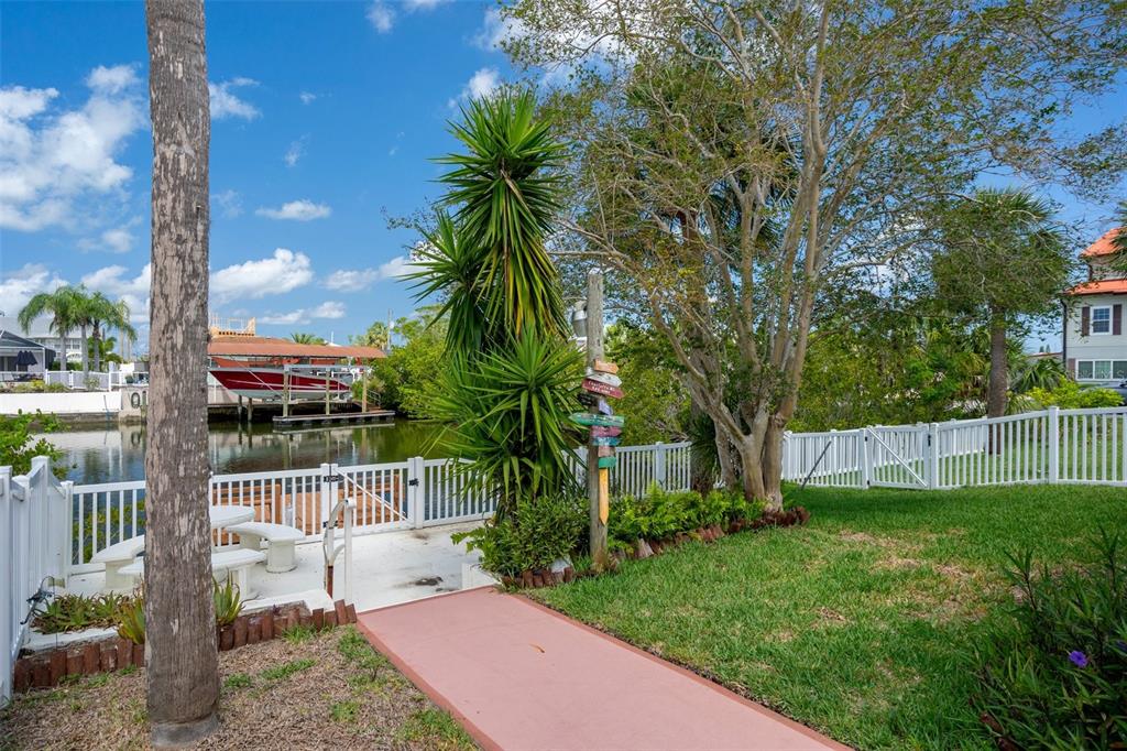4315 Flexer Drive Hernando Beach, FL 34607 - Photo 23 of 48 a view of a backyard with a garden and plants