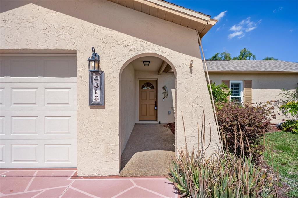 4315 Flexer Drive Hernando Beach, FL 34607 - Photo 24 of 48 a view of a small house with potted plants