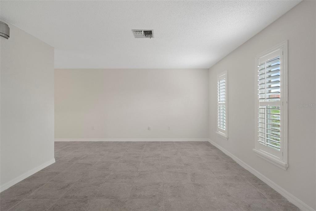 4315 Flexer Drive Hernando Beach, FL 34607 - Photo 27 of 48 an empty room with windows
