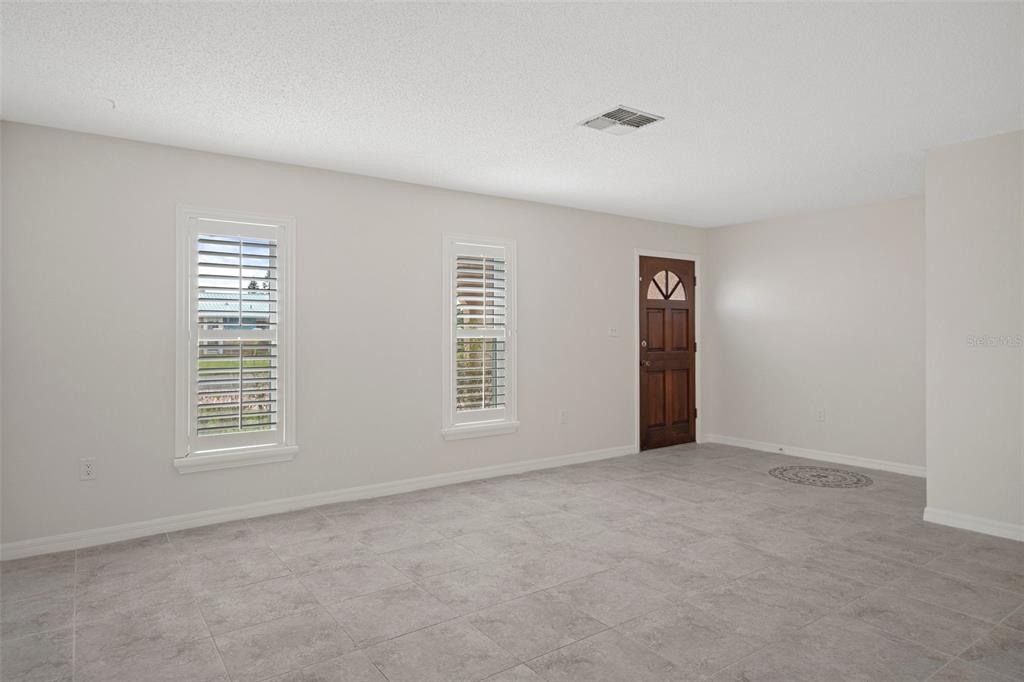 4315 Flexer Drive Hernando Beach, FL 34607 - Photo 28 of 48 an empty room with windows