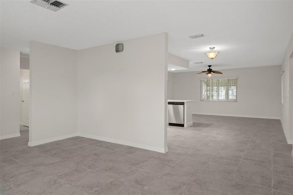 4315 Flexer Drive Hernando Beach, FL 34607 - Photo 30 of 48 an empty room with windows and cabinet