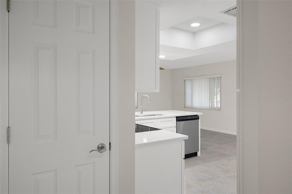 4315 Flexer Drive Hernando Beach, FL 34607 - Photo 32 of 48 a room with a sink and cabinets