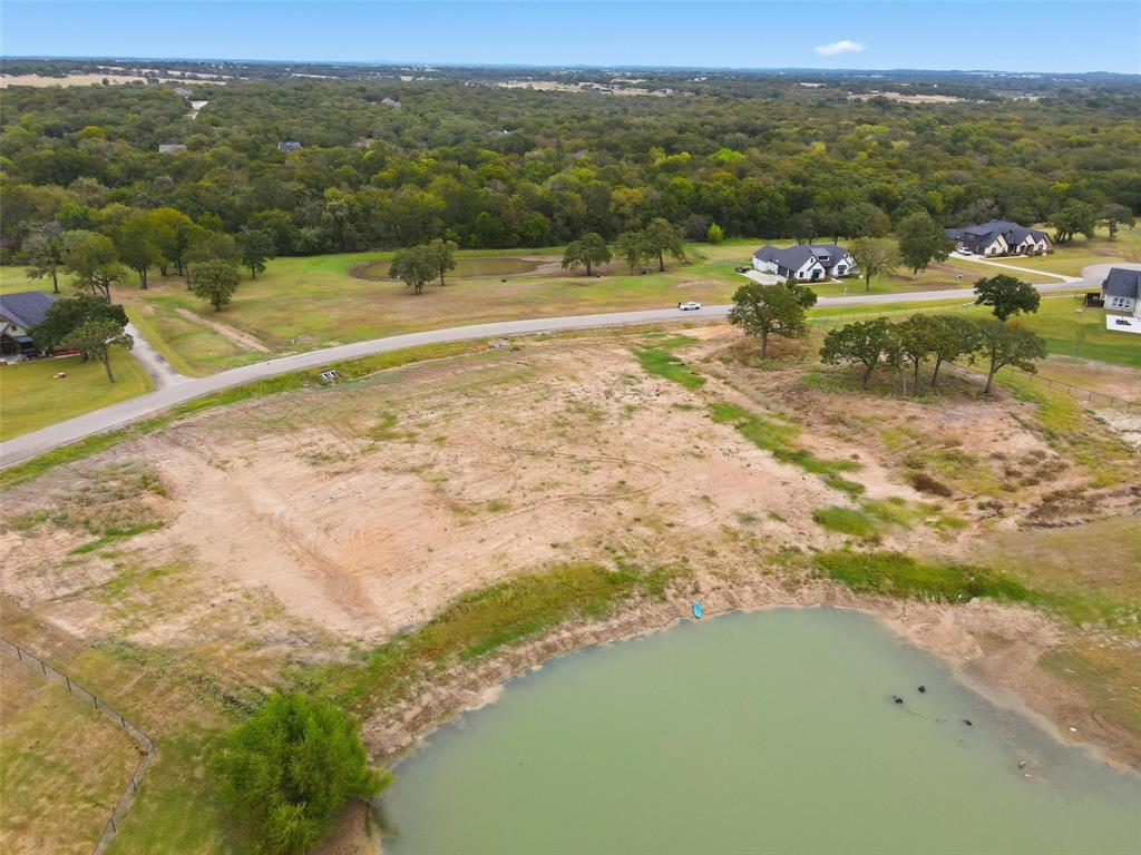 206 Rio Rancho Drive Decatur, TX 76234 - Photo 16 of 17 a view of a lake with a mountain