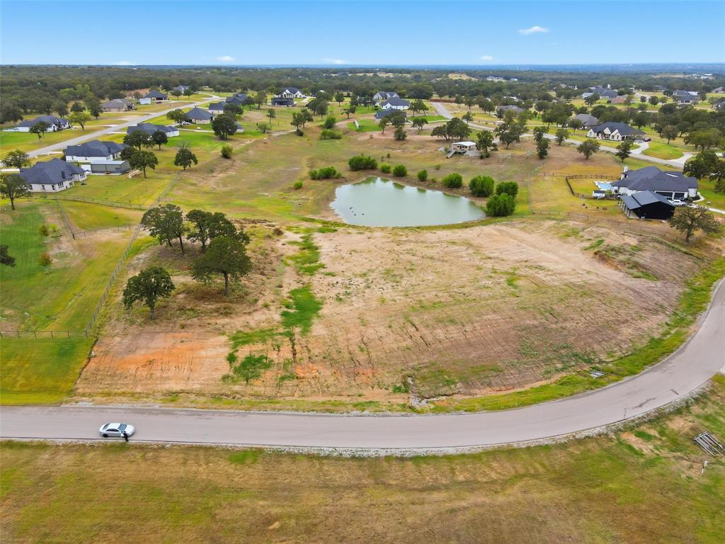 206 Rio Rancho Drive Decatur, TX 76234 - Photo 3 of 17 a view of a swimming pool with an ocean view