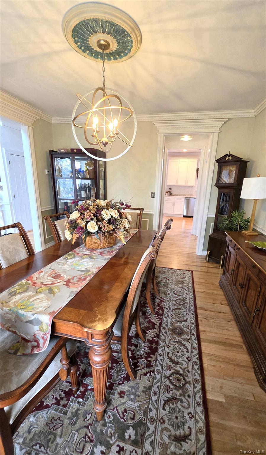 185 West Islip Road West Islip, NY 11795 - Photo 17 of 50 Sophisticated and Sunny Formal Dining Room contiguous to Large Chef's Kitchen through Butler's Pantry/Bar area for optimal serving. Pantry
