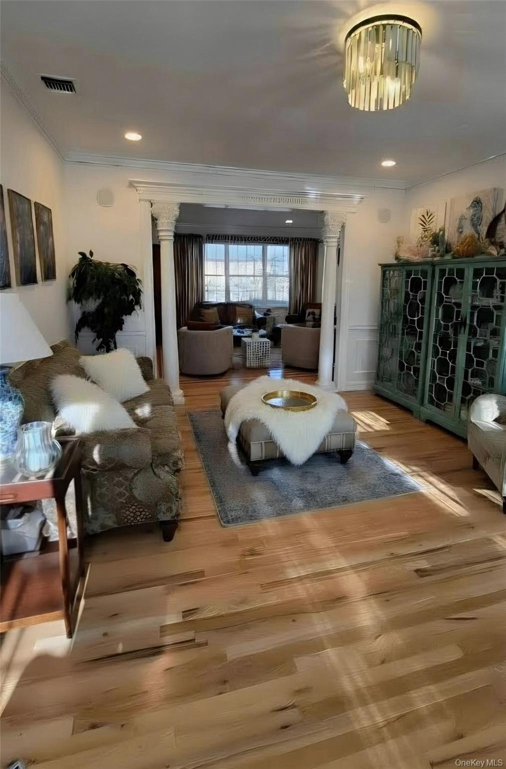 185 West Islip Road West Islip, NY 11795 - Photo 19 of 50 Huge Formal Living Room leads to Family Room through custom pillared entry
