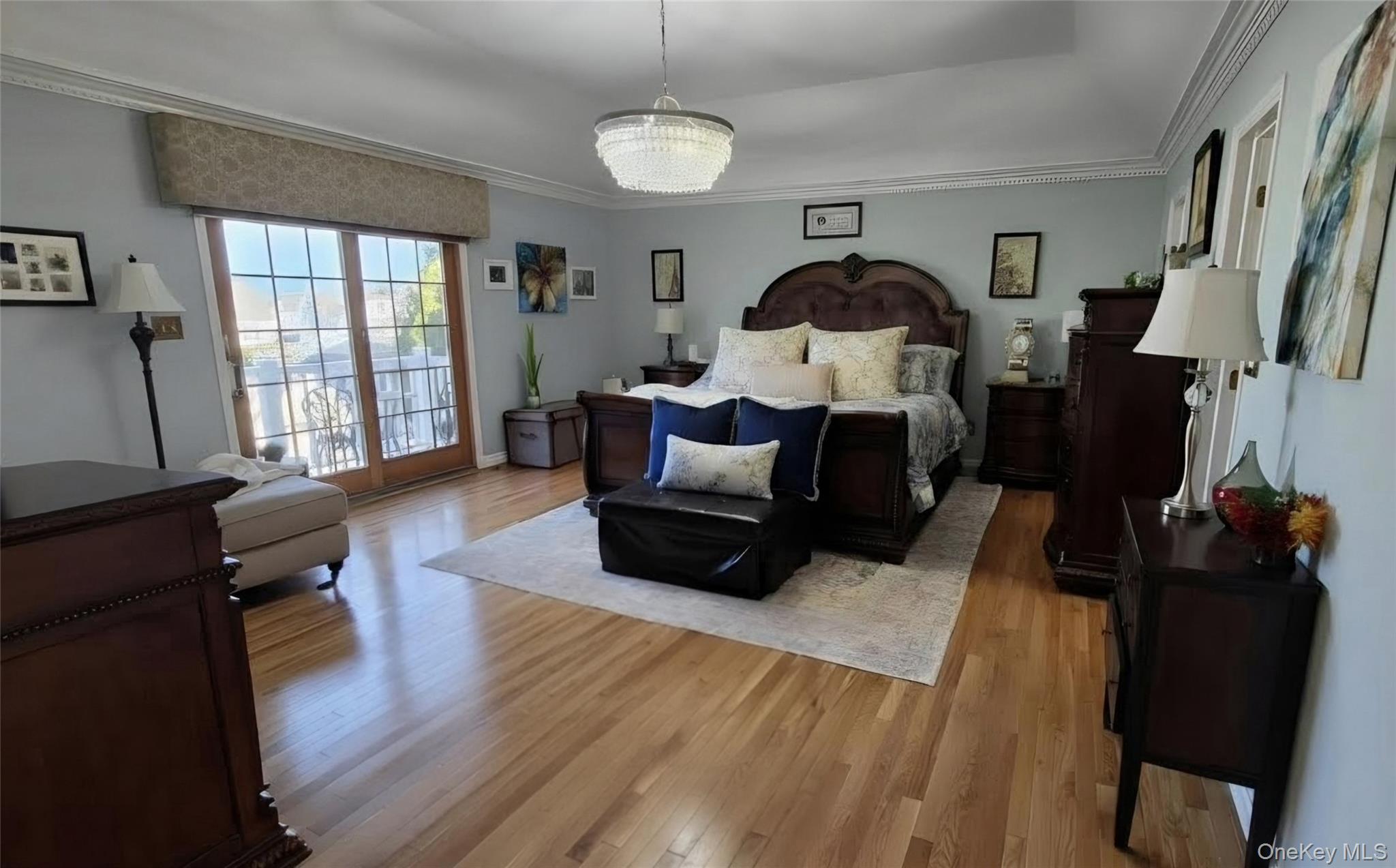 185 West Islip Road West Islip, NY 11795 - Photo 33 of 50 Primary bedroom on 2nd floor with French Doors to Balcony area overlooking the entire rear property!