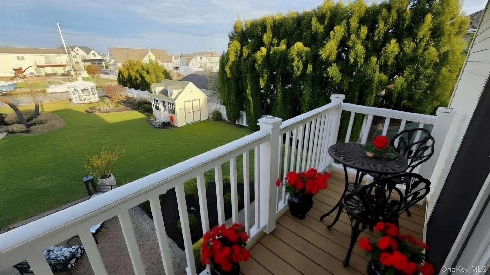 185 West Islip Road West Islip, NY 11795 - Photo 35 of 50 Beautiful balcony from Primary bedroom. Sit overlooking your beautiful resort backyard as Kings and/or Queens of your castle!!!